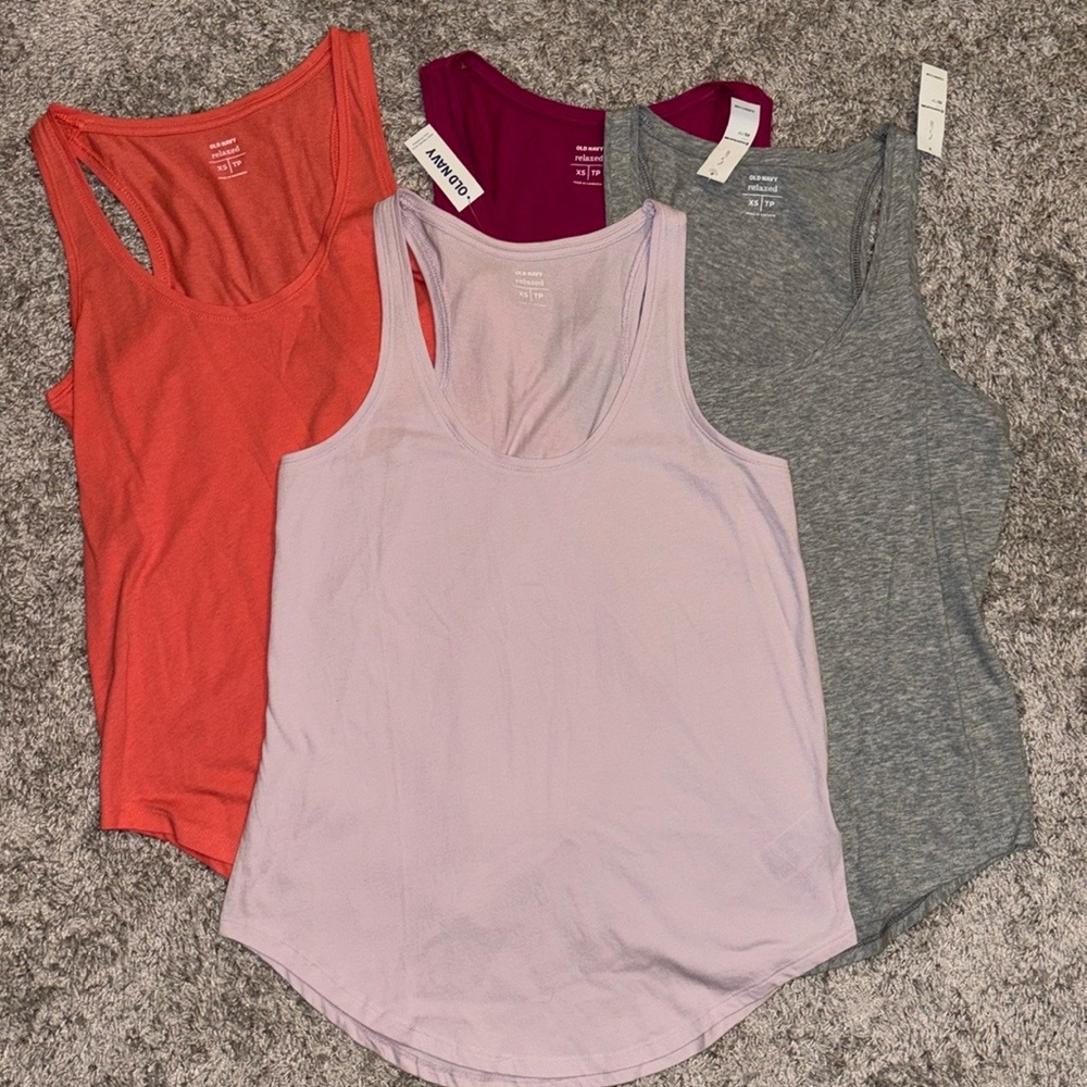 Old navy relaxed XS dark pink racerback tank top. Scoop/tulip hem. Extra small.